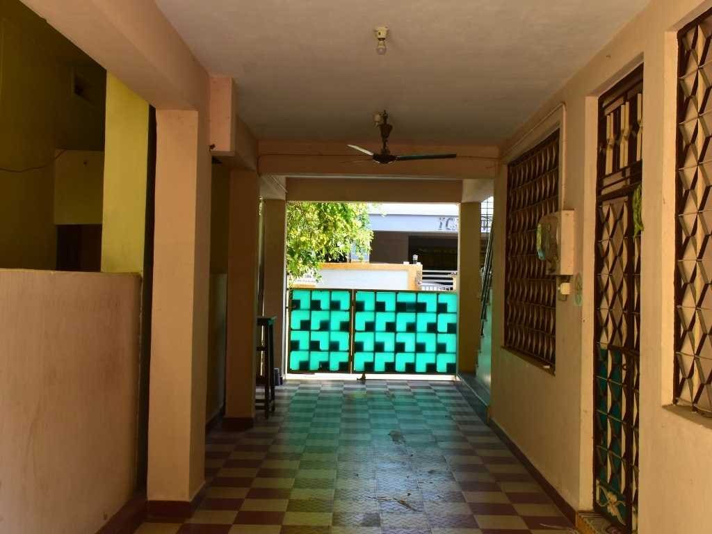 Green garden corner with banana plants at the Tirupati homestay