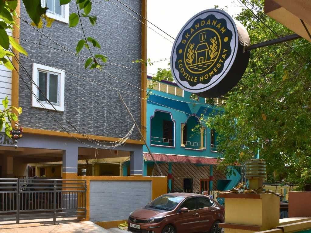 Open courtyard and parking area at Skandanam Ecoville Homestay